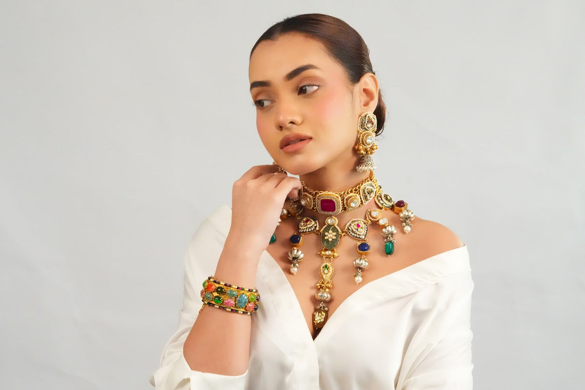 Traditional royal motif gold choker with earrings