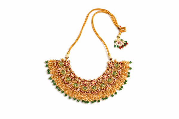 Intricate temple motif gold plated necklace with earrings