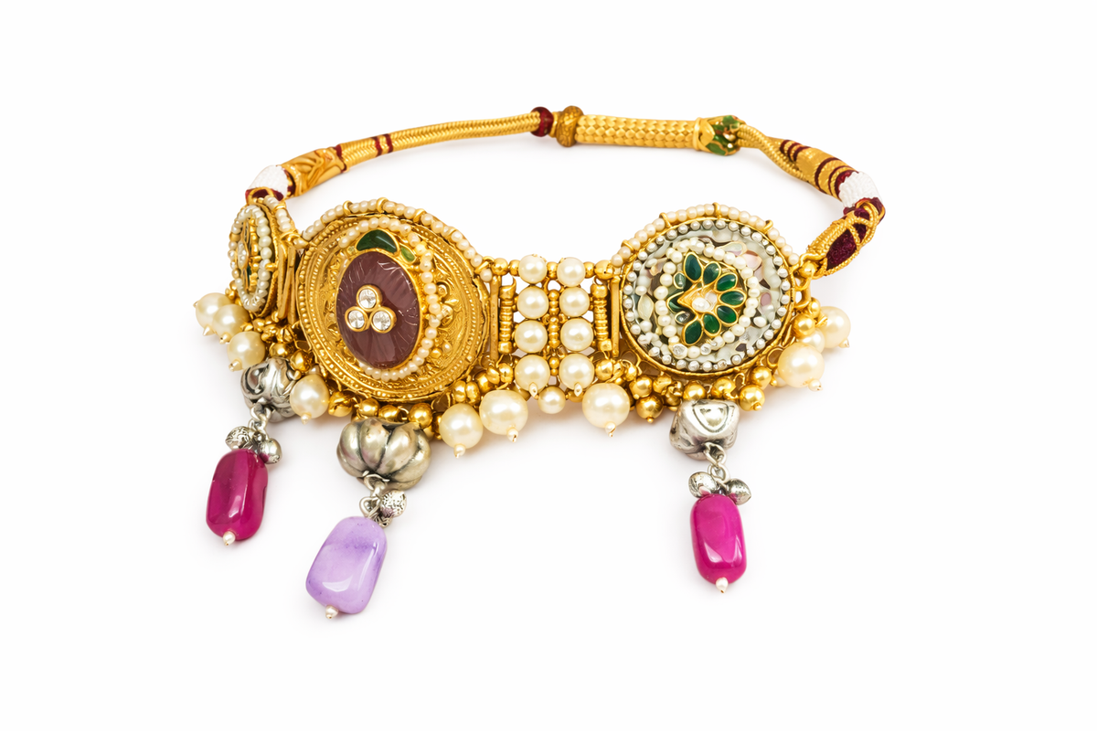 Intricate gemstone charm choker with dome earrings