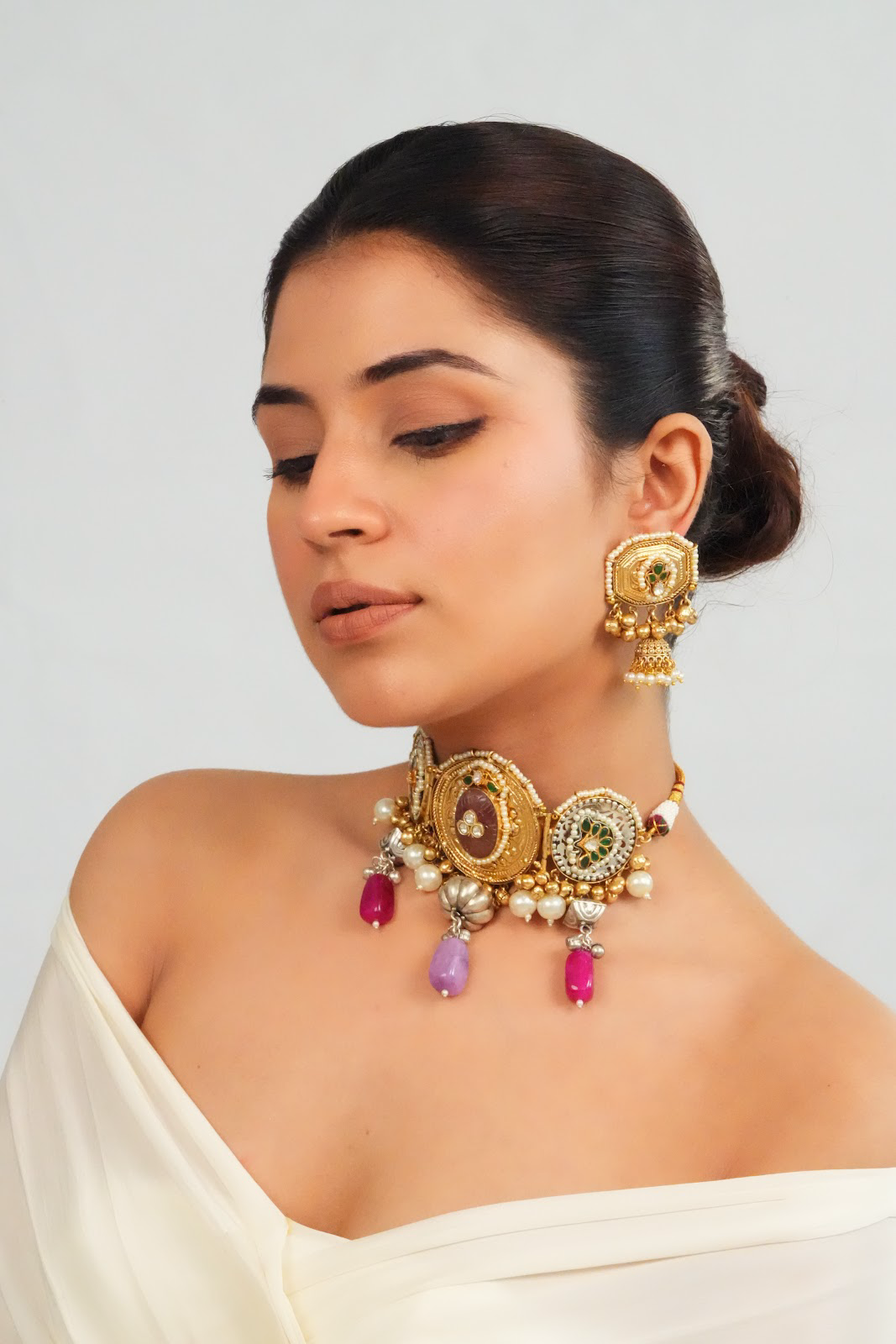 Intricate gemstone charm choker with dome earrings