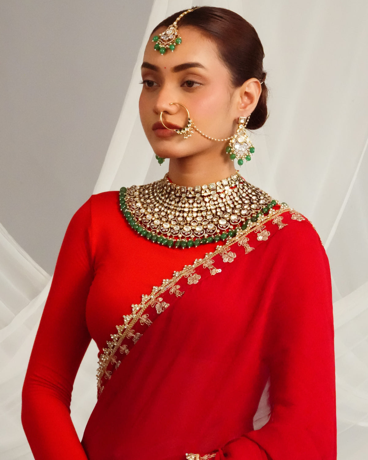 Elegant victorian fringe detailed choker with statement earrings and maangtika