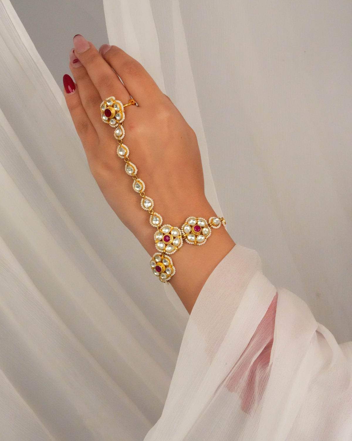Elegant multistone hand ornament
