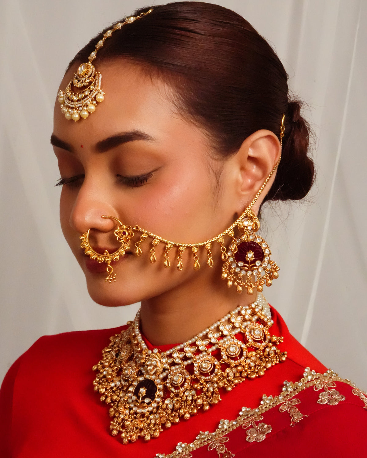 Regal carved stone collar necklace with chandelier earrings