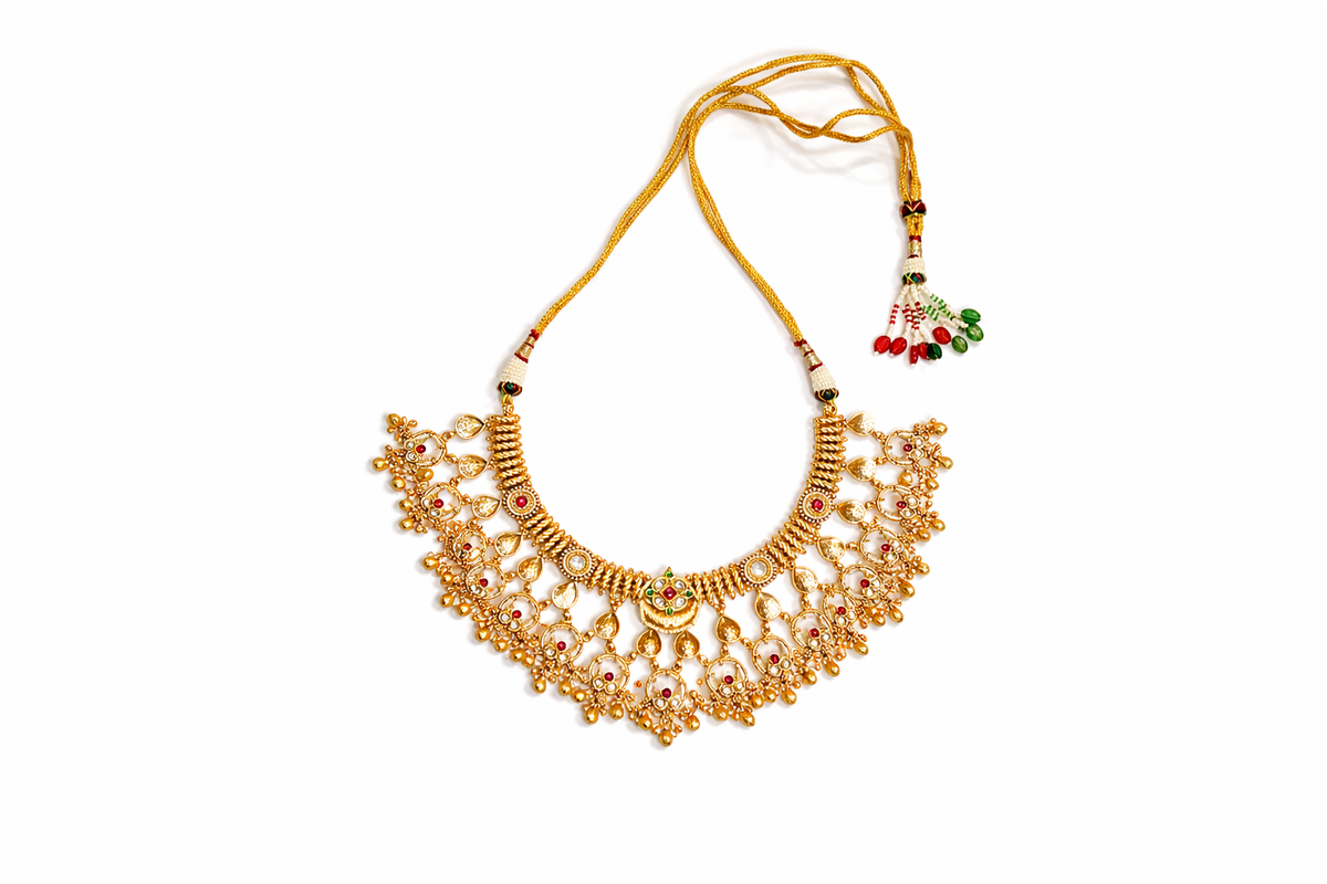 Intricate temple pattern layered collar necklace and earrings