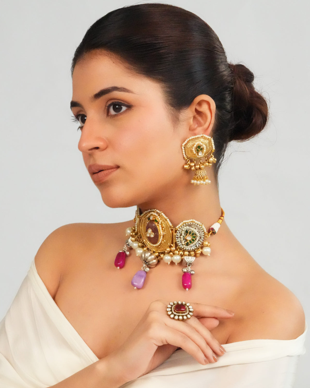 Intricate gemstone charm choker with dome earrings