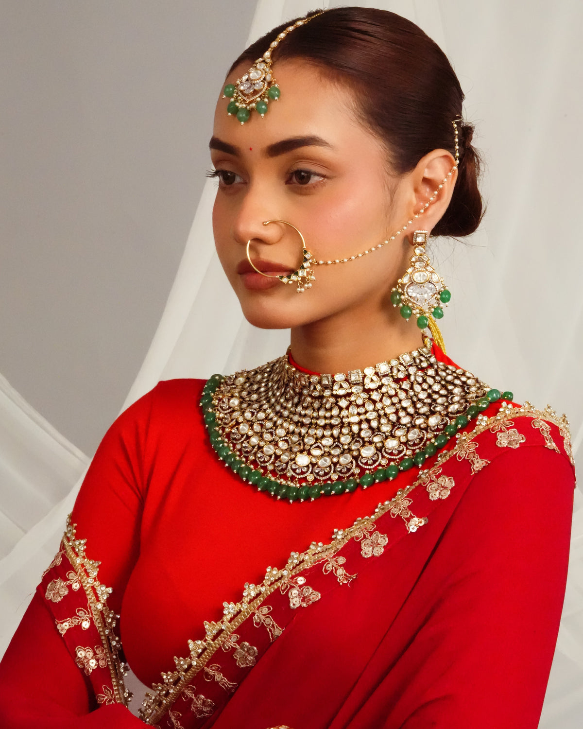 Elegant victorian fringe detailed choker with statement earrings and maangtika