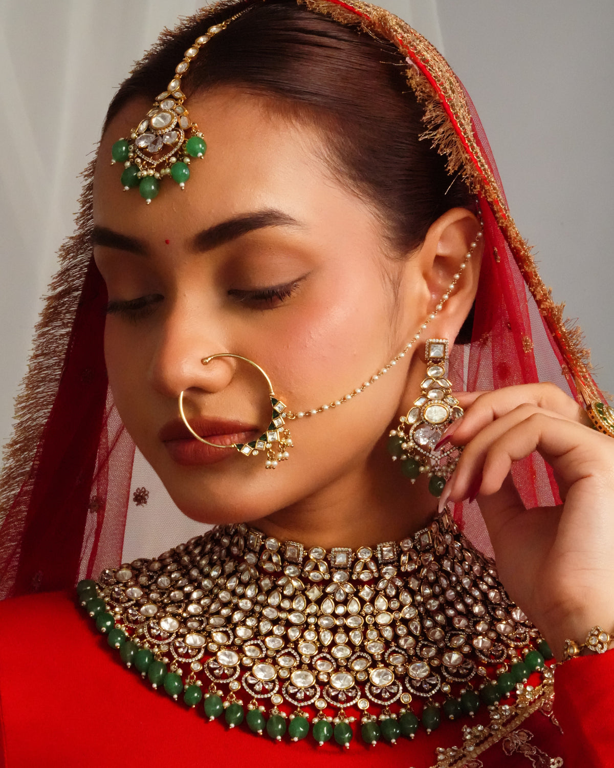 Elegant victorian fringe detailed choker with statement earrings and maangtika