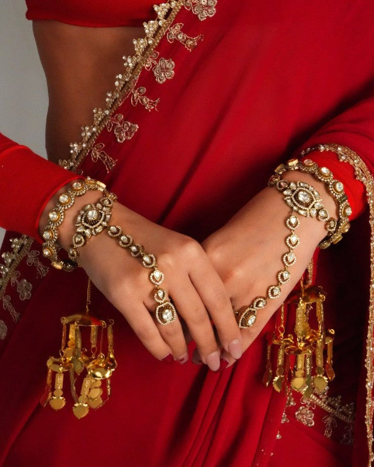 Delicate linked statement hand bracelet